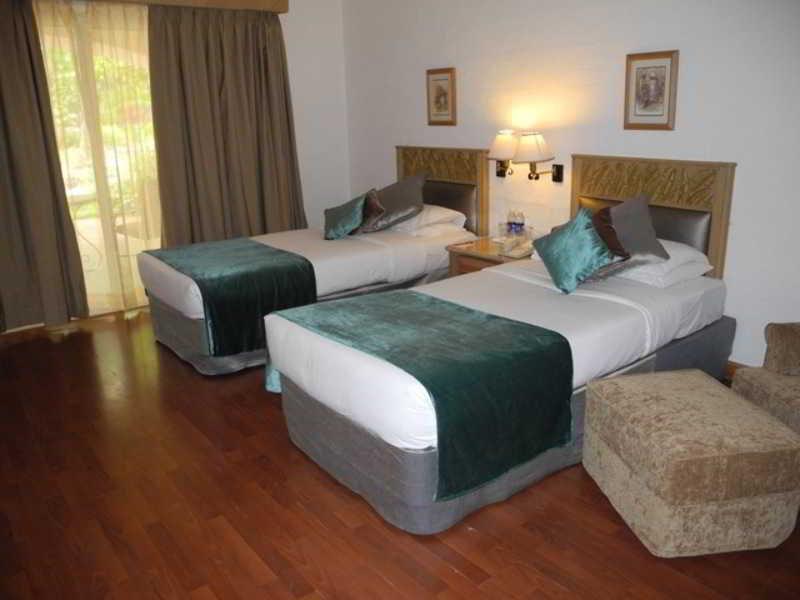 The Golden Palms Hotel & Spa Chik Banavar Exterior photo